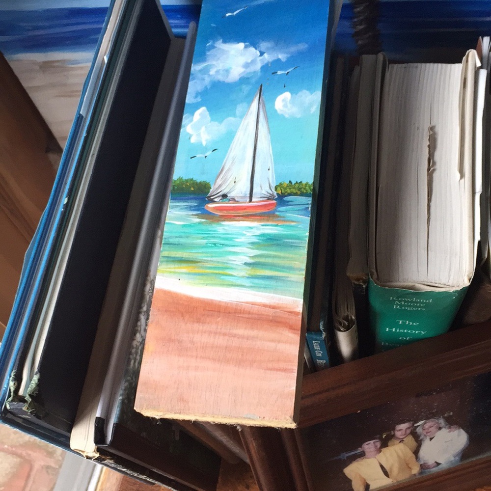 Seaside sailing scene painted on wood
